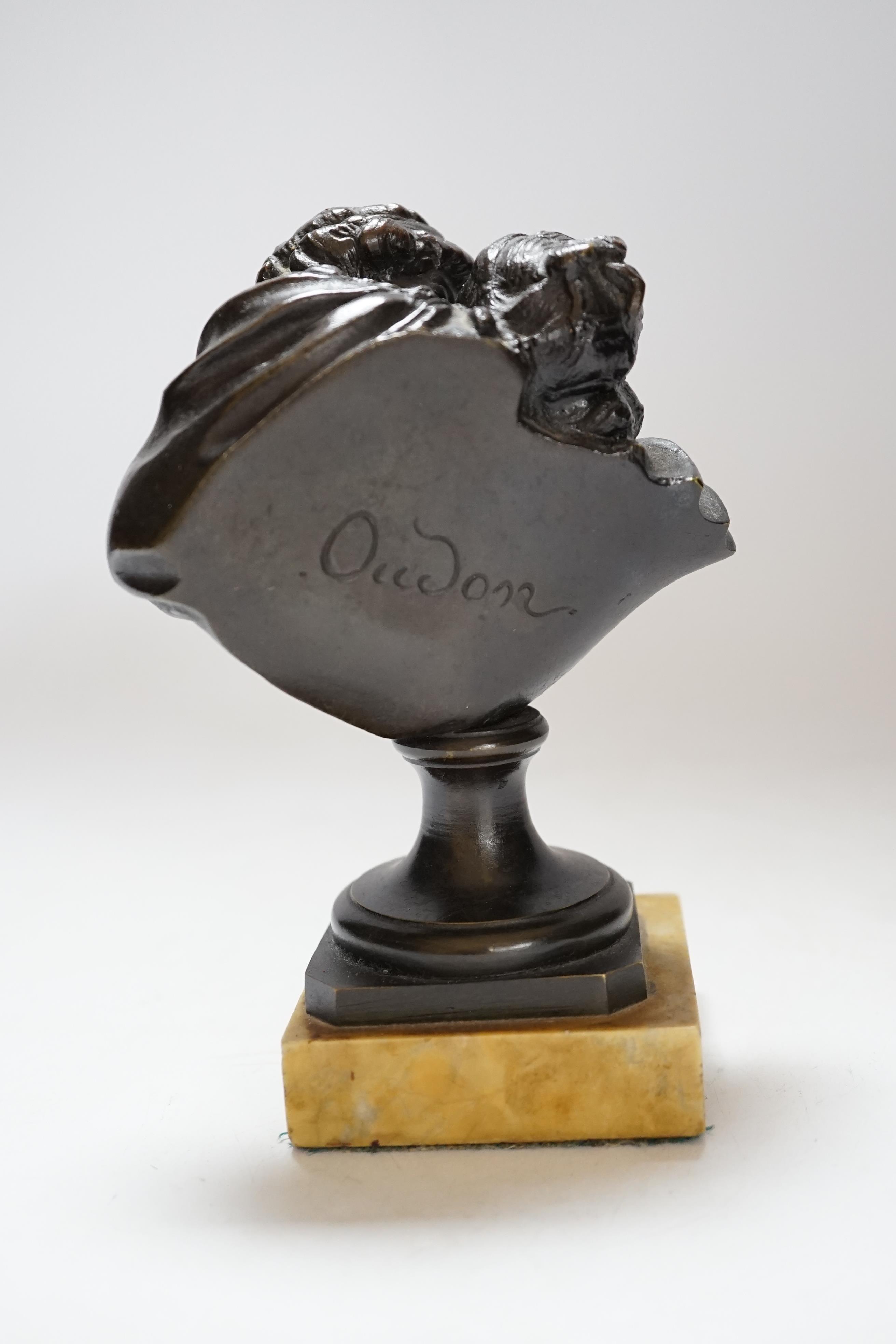 After Jean-Antoine Houdon (1741-1828), a bronze group, 'Le Baiser Donne' [‘The Kiss Bestowed’] on marble base, 16cm high